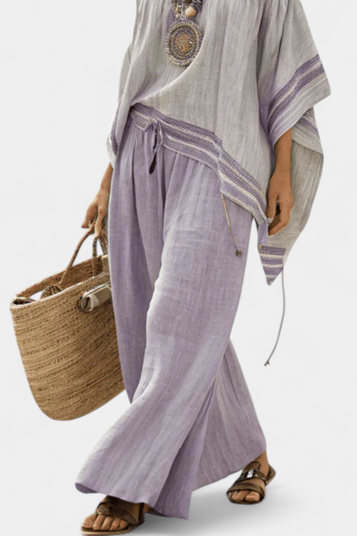 Striped bamboo linen outfit with off-shoulder top and wide-leg trousers for an elegant, fresh style