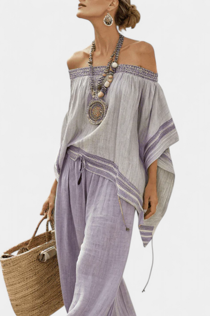 Striped bamboo linen outfit with off-shoulder top and wide-leg trousers for an elegant, fresh style