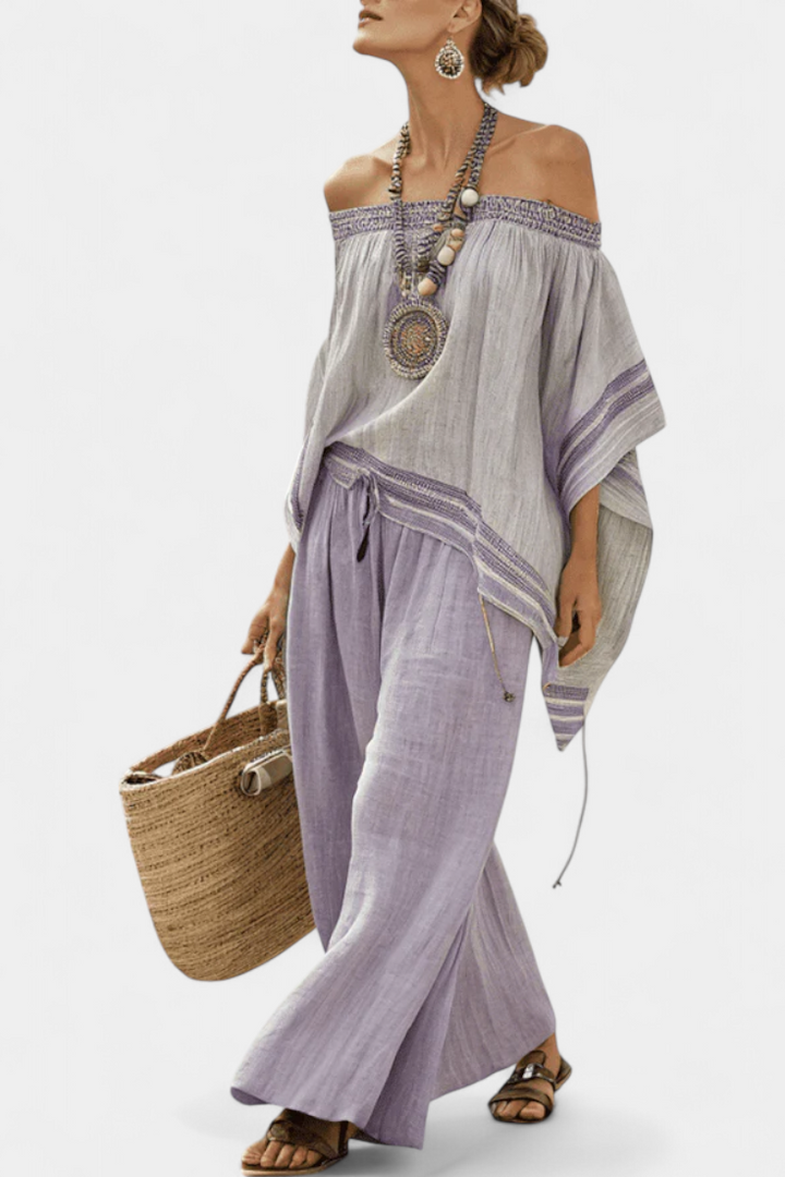 Striped bamboo linen outfit with off-shoulder top and wide-leg trousers for an elegant, fresh style