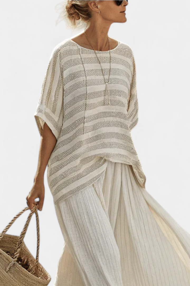 Daisy bamboo linen outfit with elegant striped blouse and flowing trousers for a modern, comfortable style