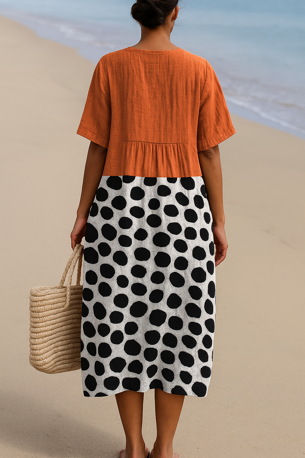 Maëlle | Orange dress with contrasting polka dots
