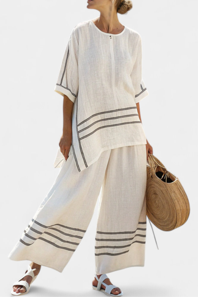 Wide-leg striped trousers with irregular cut – modern, comfortable style