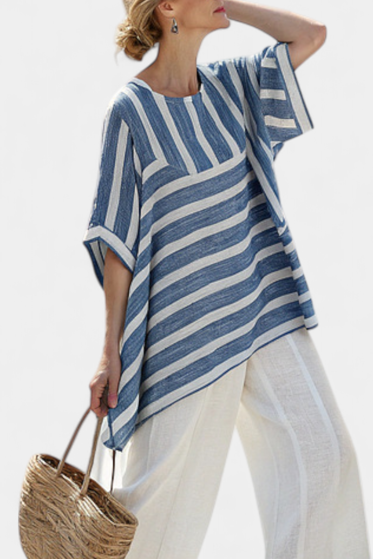 Elegant Mediterranean linen set with blue stripes and hem-finish trousers for a fresh, elegant look
