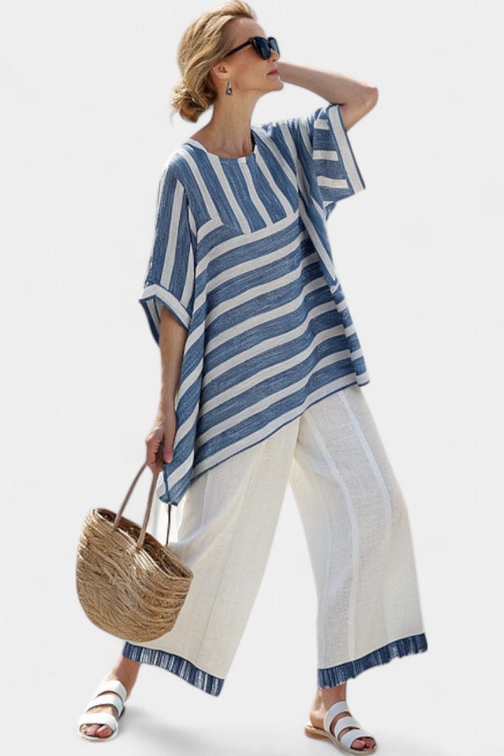 Elegant Mediterranean linen set with blue stripes and hem-finish trousers for a fresh, elegant look