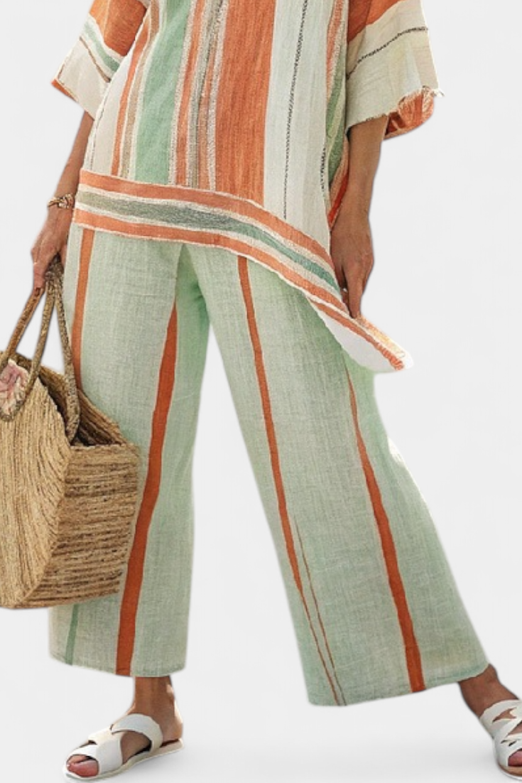 Elegant striped bamboo linen set with asymmetric blouse and wide-leg trousers for a refined style